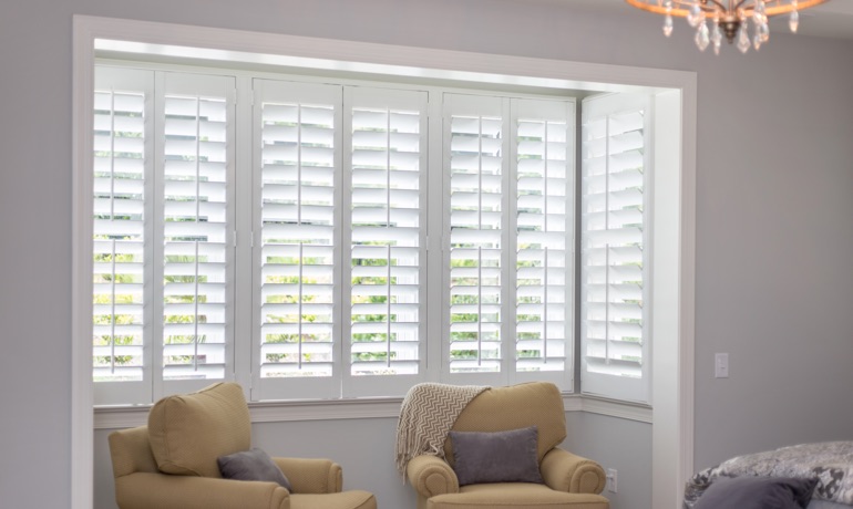 White shutters in New York bay window